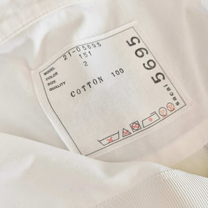 SACAI WHITE LASER CUT EYELET HANKERCHIEF HEM SHIRT (2)