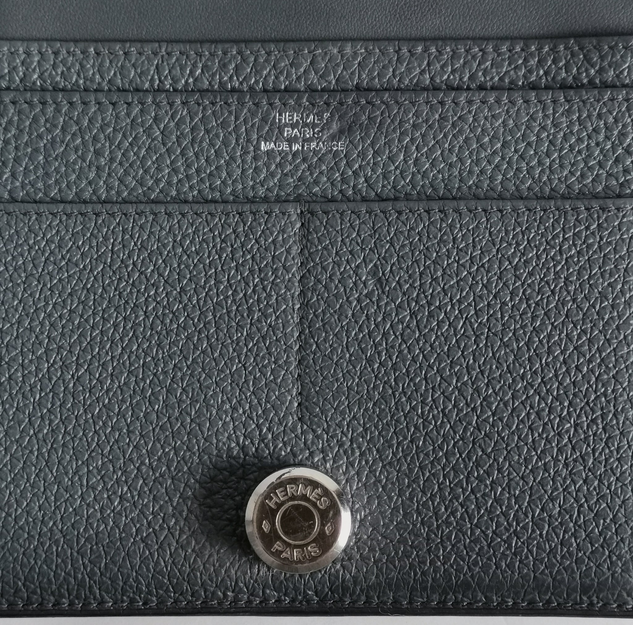 Hermès orange Dogon Duo wallet in 2023